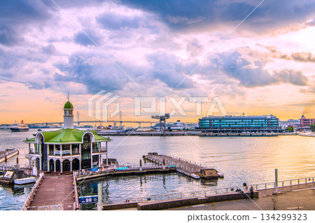 Yokohama cityscape in Japan. Three Japanese luxury cruise ships gathered in Yokohama Port. Nippon Maru (far left), Mitsui O-go (center), Asuka II at Osanbashi Pier. Yokohama cityscape in Japan. Three Japanese luxury cruise ships gathered in Yokohama Port. Nippon Maru (far left), Mitsui O-go (center), Asuka II at Osanbashi Pier. 134299323
