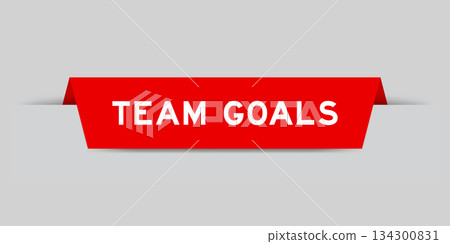 Red color inserted label with word team goals on gray background Red color inserted label with word team goals on gray background 134300831