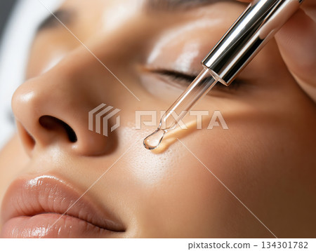 Close-up of woman applying 134301782