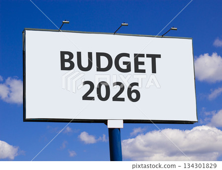 Budget 2026 symbol. Concept words Budget 2026 on beautiful big white billboard. Beautiful blue sky and clouds background. Business and budget 2026 concept. Copy space. 134301829