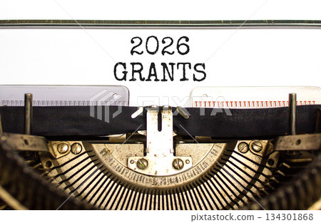 2026 Grants symbol. Concept words 2026 Grants typed on beautiful old retro typewriter. Beautiful white paper background. Beautiful old typewriter. Business and 2026 grants concept. Copy space. 134301868