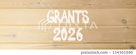 Grants 2026 symbol. Concept words Grants 2026 on beautiful wooden wall. Beautiful wooden wall background. Business and grants 2026 concept. Copy space. 134301890