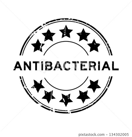 Grunge black antibacterial word with star icon round rubber seal stamp on white background 134302005
