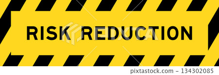 Yellow and black color with line striped label banner with word risk reduction Yellow and black color with line striped label banner with word risk reduction 134302085