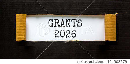 Grants 2026 symbol. Concept words Grants 2026 on beautiful white paper. Beautiful black paper background. Business and grants 2026 concept. Copy space. 134302579