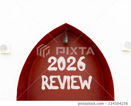 2026 Review symbol. Concept words 2026 Review on beautiful white and red wall. Beautiful white and red wall background. Business and 2026 review concept. Copy space. 2026 Review symbol. Concept words 2026 Review on beautiful white and red wall. Beautiful white and red wall background. Business and 2026 review concept. Copy space. 134304256