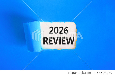 2026 Review symbol. Concept words 2026 Review on beautiful white paper. Beautiful blue paper background. Business and 2026 review concept. Copy space. 134304279