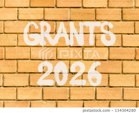 Grants 2026 symbol. Concept words Grants 2026 on beautiful old brown brick wall. Beautiful old brown brick wall background. Business and grants 2026 concept. Copy space. Grants 2026 symbol. Concept words Grants 2026 on beautiful old brown brick wall. Beautiful old brown brick wall background. Business and grants 2026 concept. Copy space. 134304280