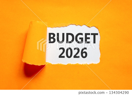 Budget 2026 symbol. Concept words Budget 2026 on beautiful white paper. Beautiful orange paper background. Business and budget 2026 concept. Copy space. Budget 2026 symbol. Concept words Budget 2026 on beautiful white paper. Beautiful orange paper background. Business and budget 2026 concept. Copy space. 134304290