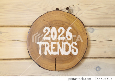 2026 Trends new year symbol. Concept words 2026 Trends on beautiful wooden circle. Beautiful wooden wall background. Business and 2026 Trends new year concept. Copy space. 2026 Trends new year symbol. Concept words 2026 Trends on beautiful wooden circle. Beautiful wooden wall background. Business and 2026 Trends new year concept. Copy space. 134304307