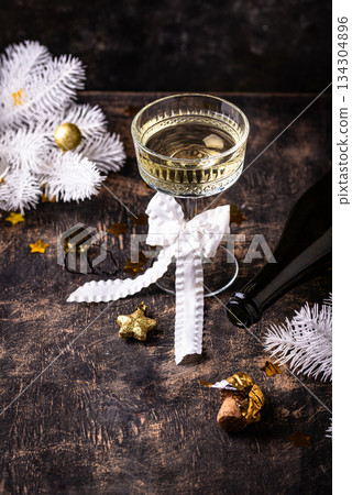 Champagne glass, traditional New year drink 134304896