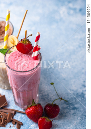 Milkshake from strawberry, banana and chocolate Milkshake from strawberry, banana and chocolate 134304904