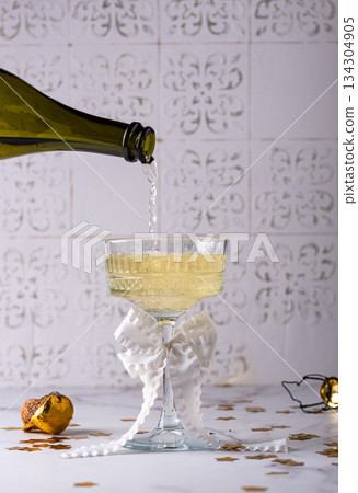 Champagne glass, traditional New year drink 134304905