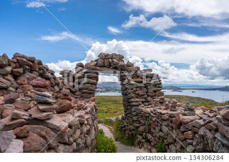 Stone pathway and arch at Pachatata archaeological site, Amantani Island, La ke Titicaca, Peru 134306284