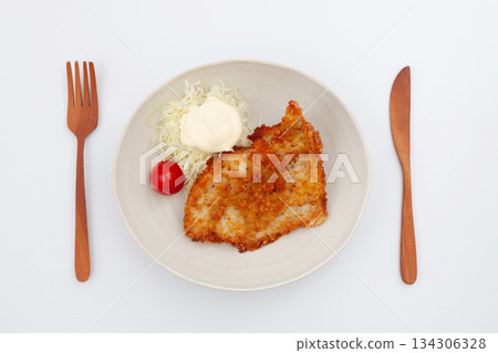 Fried chicken on a plate isolated on white background Fried chicken on a plate isolated on white background 134306328
