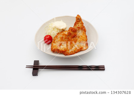 Fried chicken on a plate isolated on white background Fried chicken on a plate isolated on white background 134307628
