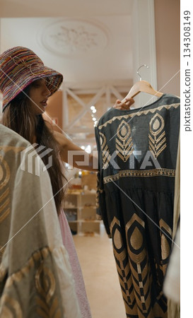 Enjoy a stylish and delightful shopping experience in a standout elegant boutique Enjoy a stylish and delightful shopping experience in a standout elegant boutique 134308149
