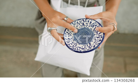 An Elegant Handcrafted Plate featuring an Intricate and Beautiful Blue Design that Captivates 134308268