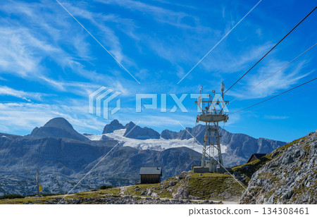 Cable car on top of a mountain in the Austrian Alps with the Gletscher glacier in the background in early autumn 134308461