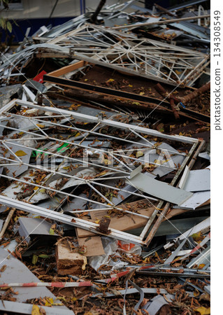 Pile of metal and wooden construction debris outdoors 134308549