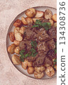 kuyrdak, roast offal with potatoes and fresh herbs, homemade in Kazakh, no people, 134308736