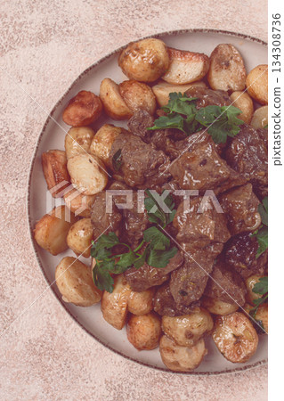 kuyrdak, roast offal with potatoes and fresh herbs, homemade in Kazakh, no people, 134308736