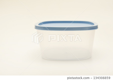 Large containers for food. Three plastic containers with a blue lid for food on a white background. Large containers for food. Three plastic containers with a blue lid for food on a white background. 134308859