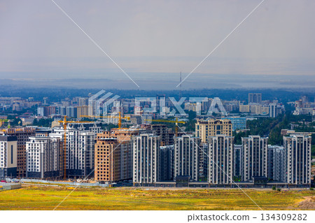 New multistory residential buildings in Bishkek city at cloudy summer day in Kyrgyzstan 134309282