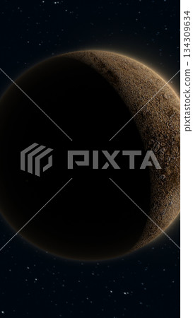Space scene showing a rocky planet partially in shadow with glowing edges against a starry night sky 134309634