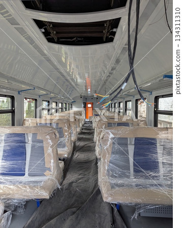 The interior of a new commuter train carriage 134311310