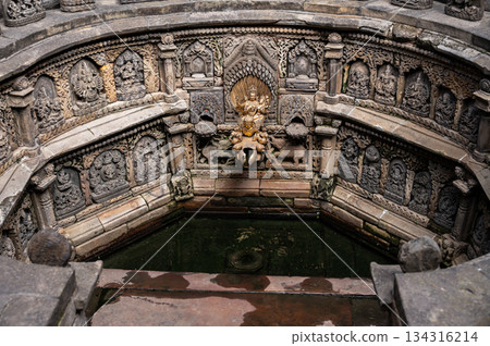 The holy carved sunken water tank (named Tusha Hiti) in royal palace of Patan Durbar square was used by the king for ritual ablutions.  134316214
