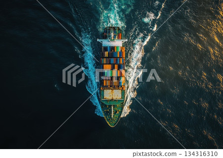 High-Resolution Image of Cargo Ship Sailing Through Ocean Waves at Sunset High-Resolution Image of Cargo Ship Sailing Through Ocean Waves at Sunset 134316310