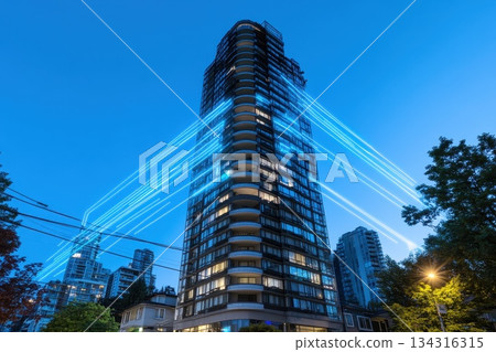 Sleek Urban Landscape at Night with Digital Lines Illuminating Modern Architecture 134316315
