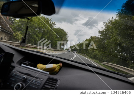 Driving on a coutntryside main road 134316406