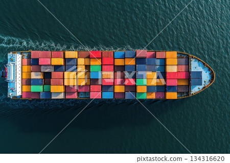 Aerial View of Cargo Ship Loaded with Colorful Containers on Global Supply Chain Network 134316620