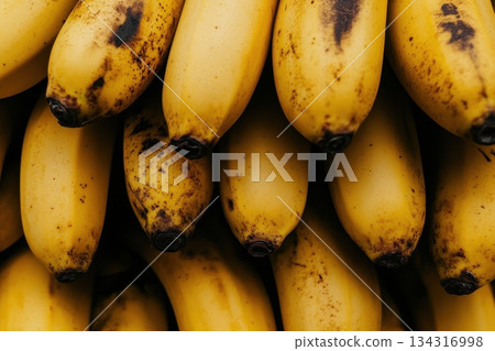 Bright Yellow Bananas Stacked in Composition for Fresh Fruit Background 134316998