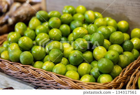 Fresh lime in a drawer on the store counter Fresh lime in a drawer on the store counter 134317561
