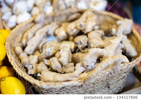 Ginger root in a basket on the counter 134317806