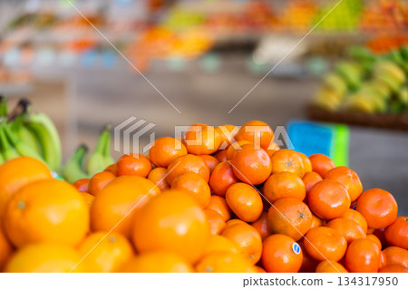 Tangerines in shop window Tangerines in shop window 134317950