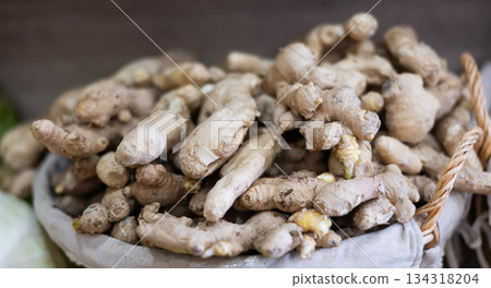 Ginger root in a basket on the counter Ginger root in a basket on the counter 134318204