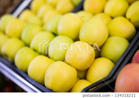 Green apples in shop window 134318211