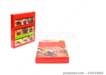 two red boxes with tea set in different angles two red boxes with tea set in different angles 134319083