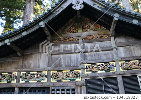 Monkey sculptures decorating the Shinto stables of Nikko Toshogu Shrine, which represent the life cycle of a human Monkey sculptures decorating the Shinto stables of Nikko Toshogu Shrine, which represent the life cycle of a human 134319328