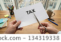 Cutting tax paper concept 134319338