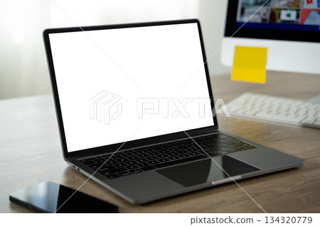 Laptop with blank screen on table. on laptop computer with blank copy space screen for your advertising text message on table 134320779