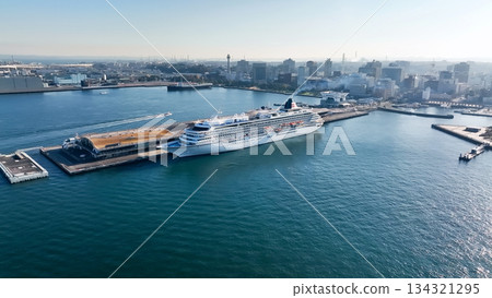 Drone aerial view of a port city and luxury cruise ship 134321295