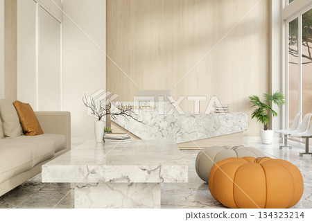 Sofa and pumpkin stool aside marble table across register counter and glass door in lounge or lobby. 134323214