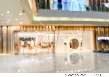 modern luxury shopping mall department store interior blur abstract background with bokeh light modern luxury shopping mall department store interior blur abstract background with bokeh light 134323369
