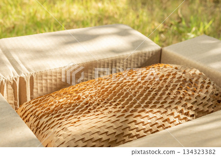 Eco friendly brown paper honeycomb wrap for product packaging parcel carton box Eco friendly brown paper honeycomb wrap for product packaging parcel carton box 134323382