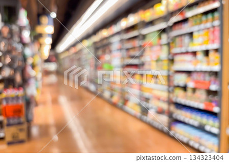 supermarket grocery store aisle and shelves blurred background supermarket grocery store aisle and shelves blurred background 134323404